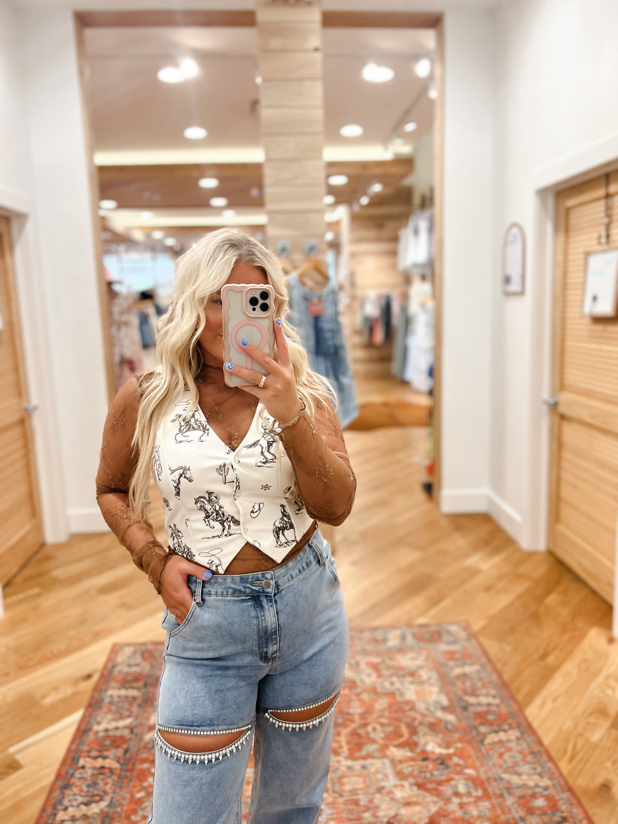 The Cowgirl Horse Vest features a stunning multi-horse design. Made with quality materials, this vest offers both comfort and style. Perfect for concerts and festivals. Boutique style Ashland, Kentucky 