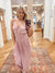 Expertly crafted from mineral washed cotton gauze, the Easy Days Mauve Jumpsuit offers a sophisticated yet casual look. The sleeveless design and adjustable straps provide a comfortable fit, while the deep V-neck and elastic waist add a touch of elegance. With side pockets for added convenience, this jumpsuit is perfect for any easy day. Boutique style Ashland, Kentucky 