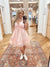 This Eden Pink Floral Mini Dress is the perfect combination of sweet and stylish. The pink floral print and ruffled design add a touch of femininity, while the sweetheart neck and sleeveless style keep it modern. The front tie, adjustable strap, and back smocking provide a perfect fit, while the shirring detail and lining add comfort and functionality. Boutique style Ashland, Kentucky 