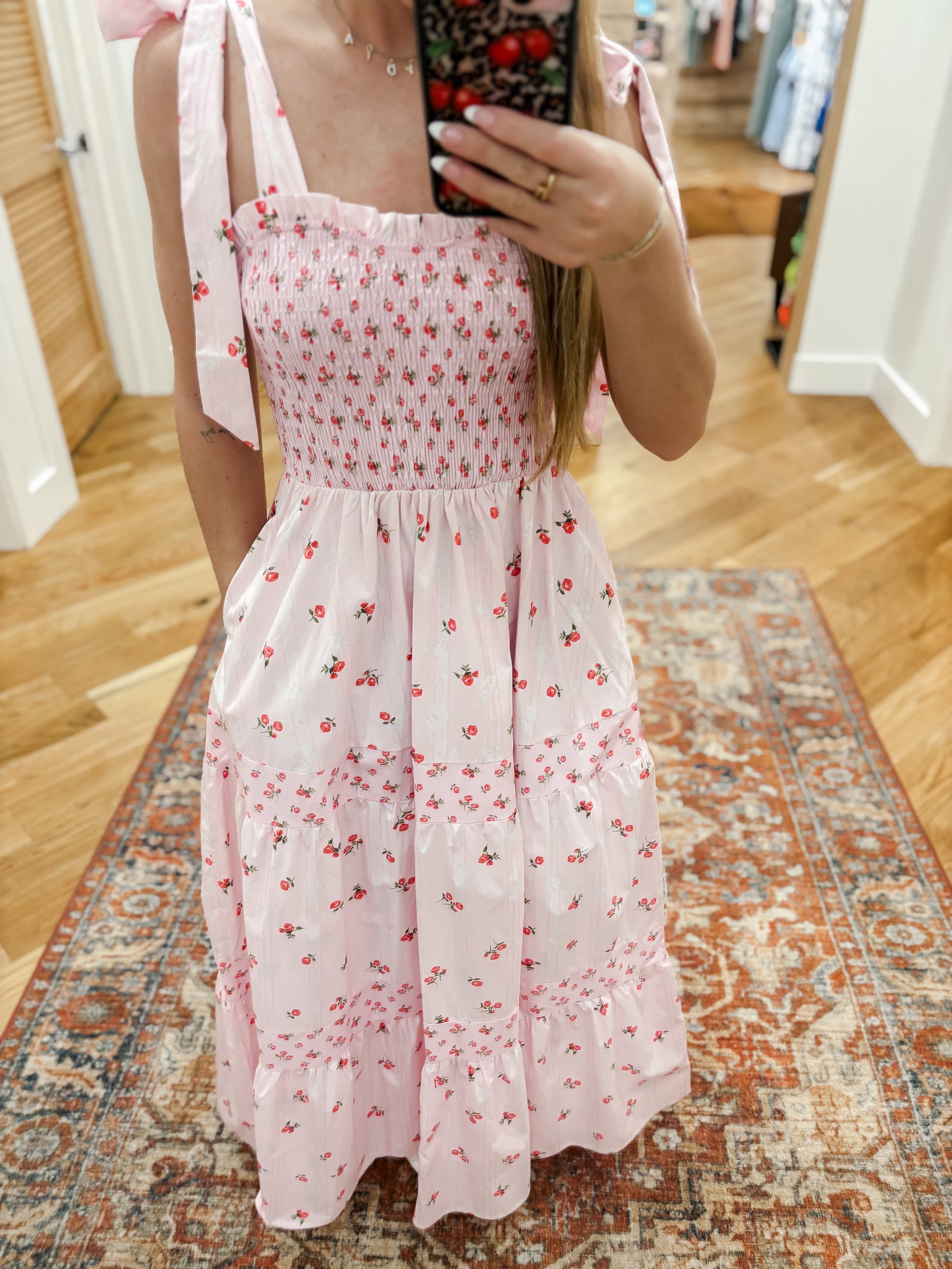 Expertly designed with a mixed floral print and 100% cotton, the Kyler Floral Maxi Dress offers a touch of femininity and comfort. The tie shoulder detailing adds a subtle yet stylish touch to this timeless maxi dress, making it the perfect choice for any occasion. Boutique style Ashland, Kentucky 
