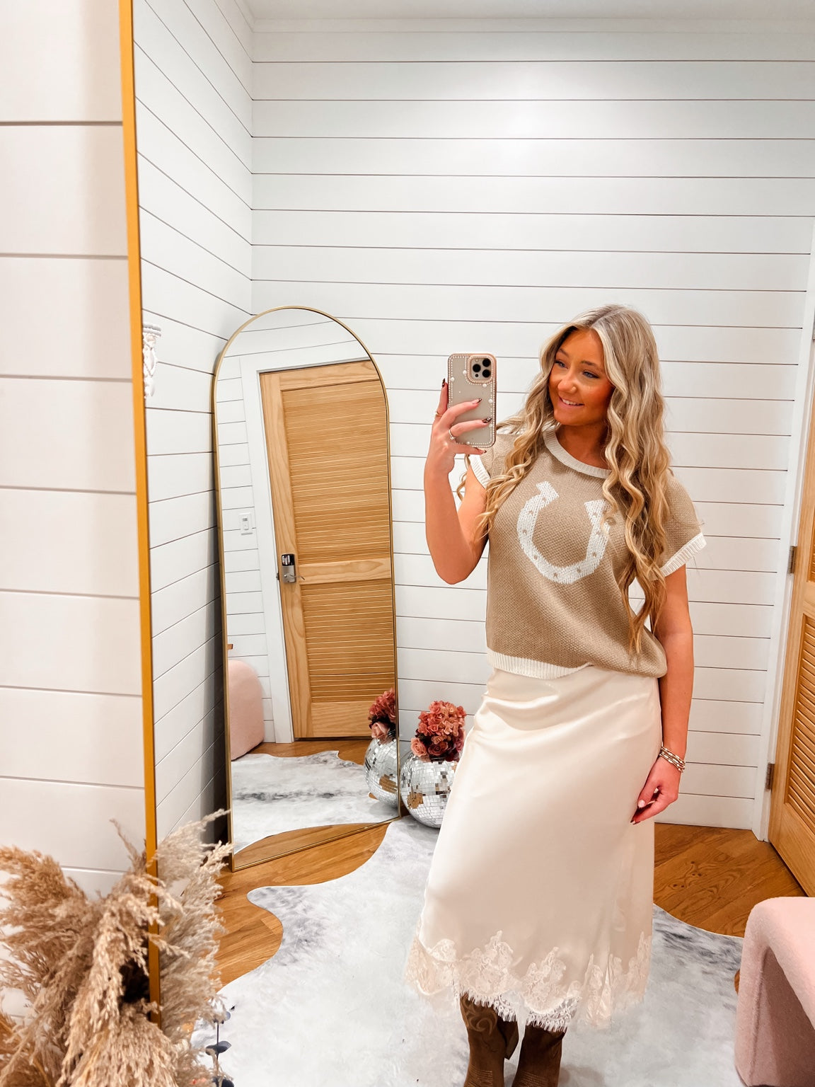 Horse Shoe Sweater styled with Rosalie Satin Cream Midi Skirt